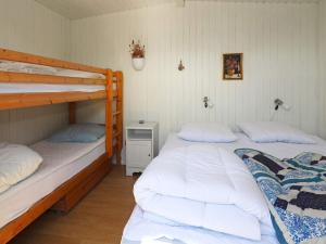 Ένα ή περισσότερα κρεβάτια σε δωμάτιο στο 4 star holiday home in Hadsund-By Traum