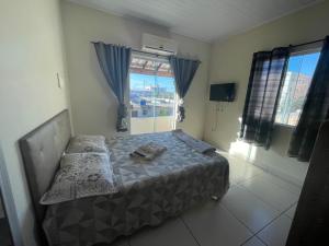 Ένα ή περισσότερα κρεβάτια σε δωμάτιο στο Casa fresca