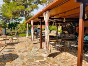 Κήπος έξω από το Bungalow BAMBOLERA