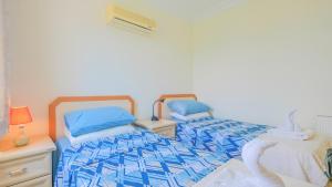 Postel nebo postele na pokoji v ubytování Villa Bemar