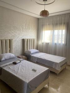 Postel nebo postele na pokoji v ubytování Appartement Tamaris