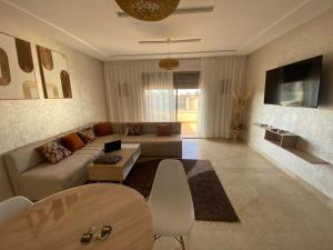 TV a/nebo společenská místnost v ubytování Appartement Tamaris + 4 fotografie