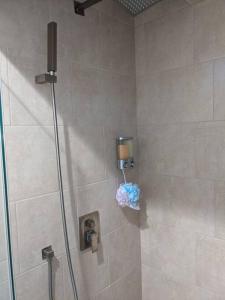 a shower with a glass door in a bathroom at Bedroom Suite with Private Entrance in Los Angeles