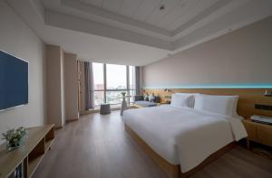 Foto dalla galleria di Westlake Art Hotel -Xiasha University Town Branch a Hangzhou