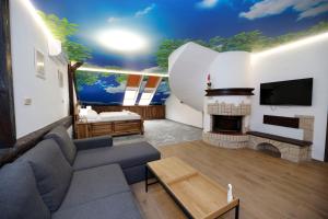 TV a/nebo společenská místnost v ubytování Hotel & wellness Hejtmanka