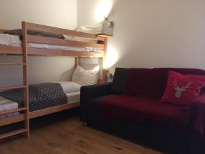 Łóżko lub łóżka w pokoju w obiekcie Chalet Noriker