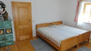 Łóżko lub łóżka w pokoju w obiekcie Ferienhaus Seitter