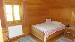 Łóżko lub łóżka w pokoju w obiekcie Ferienhaus Seitter