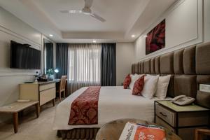 Postel nebo postele na pokoji v ubytování Iris Park Hotel New Delhi + 37 fotografií