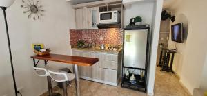 Η κουζίνα ή μικρή κουζίνα στο Studio cerca a estacion metro poblado