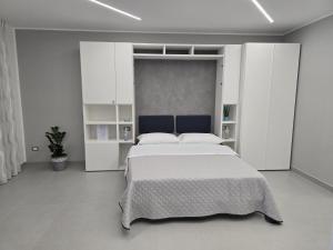 Ένα ή περισσότερα κρεβάτια σε δωμάτιο στο Casa vacanze - Arì Maison