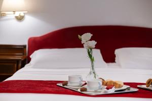 Postel nebo postele na pokoji v ubytování Hotel Hannover