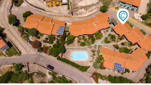 an overhead view of a house with a road at Sardinianworld - La Casa Delle Rose in Santa Caterina +44 photos