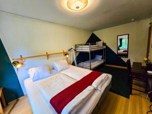 Postel nebo postele na pokoji v ubytování Nature Shelter Hotel