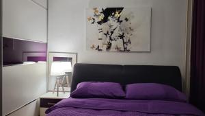 Posteľ alebo postele v izbe v ubytovaní APARTMENT AMBER s podzemnom garažom
