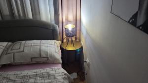 Posteľ alebo postele v izbe v ubytovaní APARTMENT AMBER s podzemnom garažom