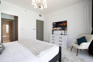 Letto o letti in una camera di Crystal Lagoon View Beach access Fast Wi-Fi
