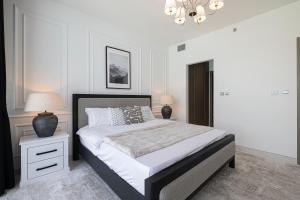 Letto o letti in una camera di Crystal Lagoon View Beach access Fast Wi-Fi