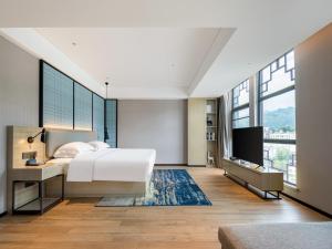 Φωτογραφία από το άλμπουμ του Echarm Hotel Baise Xilin σε Xilin