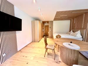 TV a/nebo společenská místnost v ubytování Apartment mit Indoor Pool und Garten