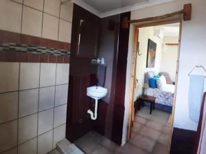 Ένα ή περισσότερα κρεβάτια σε δωμάτιο στο Erin Farmhouse & Cottages