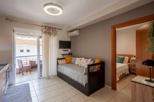 Ένα ή περισσότερα κρεβάτια σε δωμάτιο στο Cute apartment 20m from beach