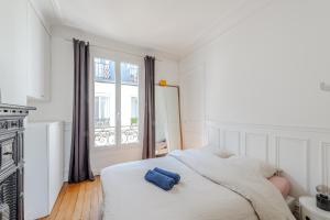 Fotografia z galérie ubytovania Charmant appartement entre Montmartre et canal Saint Martin-gare du nord v Paríži