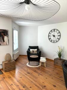Posezení v ubytování Appartement spacieux au calme