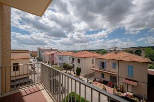 a view of a city from a balcony at Casa Vista Mare e Parcheggio in Marotta