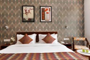 Vuode tai vuoteita majoituspaikassa Click Hotel Jaipur, Raja Park