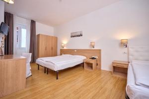 Voodi või voodid majutusasutuse Hotel Geier toas