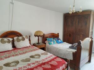 Postel nebo postele na pokoji v ubytování Gîte Le Coeurdonnier