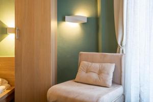 Postel nebo postele na pokoji v ubytování I Remi Del Prione by Le 5 Terre La Spezia