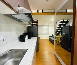 Η κουζίνα ή μικρή κουζίνα στο MegaTower Residences III, Golden Suites Baguio