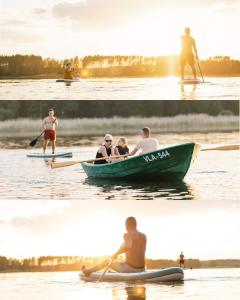 a group of people in a boat on the water at Lämmijärve parvsaun in Värska