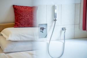 Ένα ή περισσότερα κρεβάτια σε δωμάτιο στο Hotel Vorab - Kulinarische Vielfalt