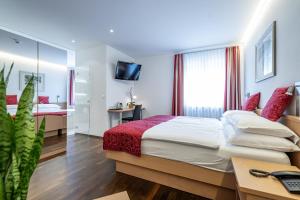 Ένα ή περισσότερα κρεβάτια σε δωμάτιο στο Hotel Vorab - Kulinarische Vielfalt