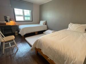 Grim Garden Guesthouse客房内的一张或多张床位