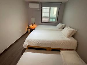 Grim Garden Guesthouse客房内的一张或多张床位
