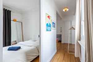 Fotografia z galérie ubytovania Charmant appartement entre Montmartre et canal Saint Martin-gare du nord v Paríži