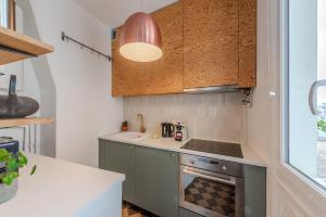 Fotografia z galérie ubytovania Charmant appartement entre Montmartre et canal Saint Martin-gare du nord v Paríži