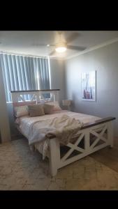 Ένα ή περισσότερα κρεβάτια σε δωμάτιο στο Spacious Apartment Oasis