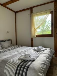 Postel nebo postele na pokoji v ubytování Kuća Tajna Banja Vrujci + 37 fotografií