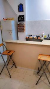 Kuchyň nebo kuchyňský kout v ubytování Younes House