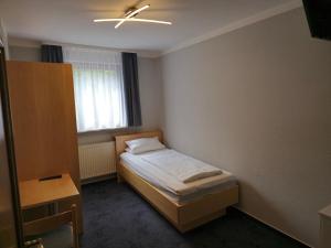 Postel nebo postele na pokoji v ubytování Gasthof Tut