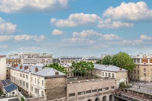 Fotografia z galérie ubytovania Charmant appartement entre Montmartre et canal Saint Martin-gare du nord v Paríži