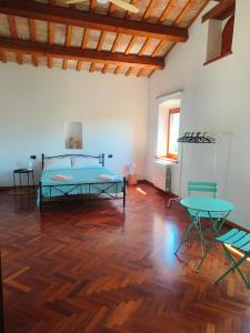 Letto o letti in una camera di B&B Nel Vigneto