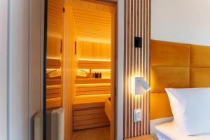 Posteľ alebo postele v izbe v ubytovaní Oaza Spa z prywatną Sauną by Perłowa Przystań Rent