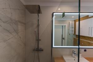 Kúpeľňa v ubytovaní Oaza Spa z prywatną Sauną by Perłowa Przystań Rent