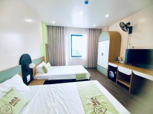Katil atau katil-katil dalam bilik di Mia motel